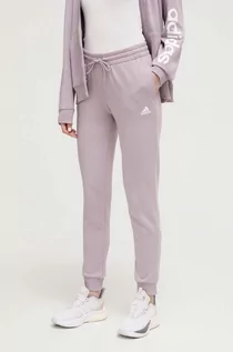 Spodnie damskie - adidas spodnie dresowe bawełniane kolor różowy z nadrukiem - grafika 1