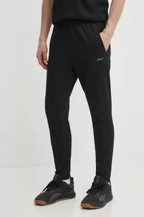 Spodnie męskie - Reebok spodnie treningowe Strength kolor czarny gładkie 100075596 - grafika 1