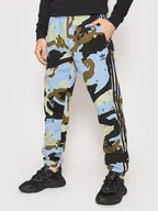 Spodnie sportowe męskie - Adidas Spodnie dresowe Graphics Camo H13465 Niebieski Regular Fit - miniaturka - grafika 1