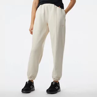 Spodnie damskie - Spodnie damskie New Balance WP23553GIE  beżowe - grafika 1