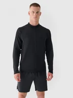 Bluzy sportowe męskie - Męska bluza treningowa bezszwowa męska 4F x Robert Lewandowski - czarna - RL9 - miniaturka - grafika 1