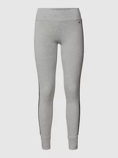 Legginsy z detalami z logo - Spodnie sportowe damskie - miniaturka - grafika 1