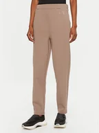 Spodnie sportowe damskie - Calvin Klein Spodnie dresowe Satin K20K207945 Beżowy Slim Fit - miniaturka - grafika 1