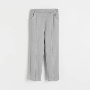 Spodnie i spodenki dla dziewczynek - Reserved - Spodnie z rozcięciami - Szary - grafika 1