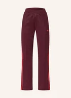 Spodnie damskie - Adidas Originals Spodnie Dresowe Graphic Crest braun - adidas Originals - miniaturka - grafika 1