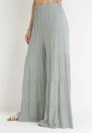 Spodnie damskie - Miętowe Szerokie Spodnie z Gumką w Pasie Bemataria - miniaturka - grafika 1