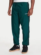 Spodnie sportowe męskie - adidas Spodnie dresowe Brushed JX3079 Zielony Regular Fit - miniaturka - grafika 1