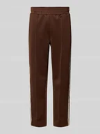 Spodnie sportowe męskie - Spodnie dresowe o kroju regular fit z elastycznym pasem Model 'RIBER' - miniaturka - grafika 1