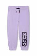 Spodnie i spodenki dla dziewczynek - HUGO spodnie dresowe bawełniane dziecięce kolor fioletowy z nadrukiem - Hugo - miniaturka - grafika 1