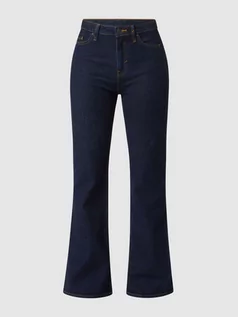 Spodnie damskie - Jeansy z poszerzaną nogawką z dodatkiem streczu - grafika 1