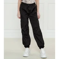 Spodnie sportowe damskie - Guess Spodnie Relaxed fit - miniaturka - grafika 1