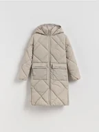 Kurtki i płaszcze dla dziewczynek - Reserved - Długi pikowany płaszcz z kapturem - beżowy - miniaturka - grafika 1