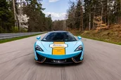 Czasopisma - Co-drive MCLAREN 570GT po torze dla dziecka - miniaturka - grafika 1
