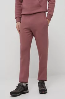 Spodnie męskie - Peak Performance spodnie męskie kolor różowy gładkie - grafika 1