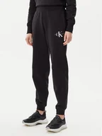 Spodnie sportowe damskie - Calvin Klein Jeans Spodnie dresowe Monologo J20J225354 Czarny Slim Fit - miniaturka - grafika 1