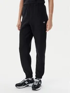 Spodnie sportowe damskie - Champion Spodnie dresowe 117872 Czarny Slim Fit - miniaturka - grafika 1