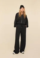 Spodnie damskie - Stradivarius Miękkie spodnie jogger palazzo Ciemnoszary M - miniaturka - grafika 1