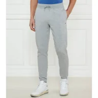 Dresy męskie - Tommy Jeans Spodnie dresowe Slim Fit - miniaturka - grafika 1