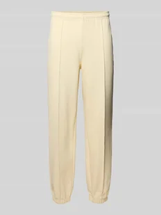 Spodnie dresowe o kroju regular fit z mieszanki bawełny - Bluzy męskie - miniaturka - grafika 1