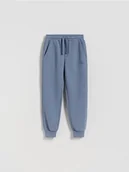 Spodnie i spodenki dla chłopców - Reserved - Joggery z bawełną - granatowy - miniaturka - grafika 1