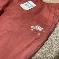 Dresy damskie - NIKE SPODNIE SPORTOWE DAMSKIE R. XL CEGLASTE CIENKIE KIESZENIE WIĄZANIE - miniaturka - grafika 1