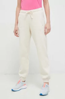 Spodnie damskie - adidas spodnie dresowe kolor beżowy gładkie - grafika 1