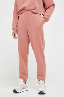 Spodnie damskie - 4F spodnie dresowe kolor różowy gładkie - grafika 1