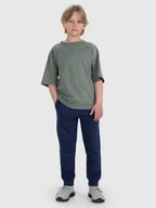 Spodnie i spodenki dla chłopców - 4F Spodnie dresowe joggery chłopięce - granatowe 122 (6-7 lat) - miniaturka - grafika 1