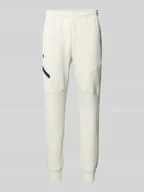 Spodnie sportowe męskie - Spodnie dresowe z elastycznym ściągaczem - miniaturka - grafika 1