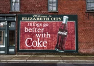 Plakaty - Coca-Cola mural that doubles as a welcome sign in Elizabeth City, North Carolina., Carol Highsmith - plakat 70x50 cm - miniaturka - grafika 1