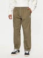 Spodnie sportowe męskie - adidas Spodnie dresowe JP4488 Zielony Loose Fit - miniaturka - grafika 1