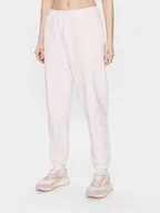 Spodnie sportowe damskie - New Balance Spodnie dresowe Athletics Nature WP23553 Różowy Relaxed Fit - miniaturka - grafika 1