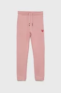 Spodnie damskie - Tommy Hilfiger spodnie bawełniane dziecięce kolor różowy z nadrukiem - miniaturka - grafika 1
