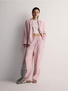 Spodnie damskie - Reserved - Szerokie spodnie z lnem - pastelowy róż - miniaturka - grafika 1