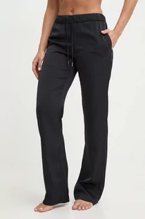 Piżamy damskie - Calvin Klein spodnie piżamowe damskie kolor czarny satynowa K20K206662 - grafika 1