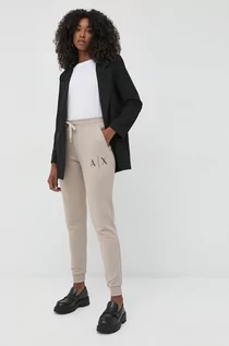 Spodnie damskie - Armani Exchange spodnie dresowe bawełniane damskie kolor beżowy z aplikacją - grafika 1