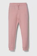 Spodnie i spodenki dla dziewczynek - Guess spodnie dresowe dziecięce kolor różowy gładkie - miniaturka - grafika 1