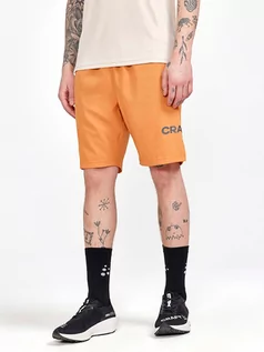 Spodnie sportowe męskie - Craft Szorty "Core Essence" w kolorze pomarańczowym do biegania - grafika 1