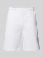 Spodnie sportowe męskie - Szorty z dzianiny dresowej o kroju regular fit z naszywką z logo - miniaturka - grafika 1