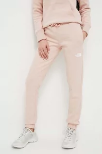 Spodnie damskie - The North Face spodnie dresowe bawełniane kolor różowy gładkie - grafika 1