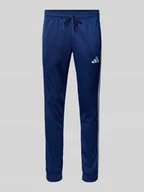 Spodnie sportowe męskie - Spodnie treningowe z wyhaftowanym logo i elastycznym pasem - miniaturka - grafika 1