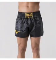 Kimona, stroje i obuwie - Everlast Spodenki Muay Thai Black/Gold Rozmiar Xl - miniaturka - grafika 1