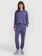 Spodnie sportowe damskie - 4F Spodnie dresowe joggery z modalem damskie - granatowe L - miniaturka - grafika 1