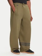 Spodnie sportowe męskie - adidas Spodnie dresowe Neuclassics JW5444 Zielony Loose Fit - miniaturka - grafika 1