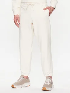 New Balance Spodnie dresowe MP23551 Écru Relaxed Fit - Spodnie sportowe męskie - miniaturka - grafika 1