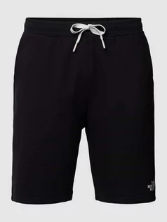 Spodnie sportowe męskie - Szorty z dzianiny dresowej o kroju regular fit z nadrukiem z logo model ‘ZUMU’ - grafika 1
