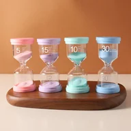 Inne - TEMU 1 szt./4 szt., Kolorowy Timer Piaskowy Marcaron Timer 5 Min/ 10 Min/ 15 Min/ 30 Min Zegar Piaskowy do Gier, Klas, Domu, Biura, Dekoracji Kuchni - miniaturka - grafika 1