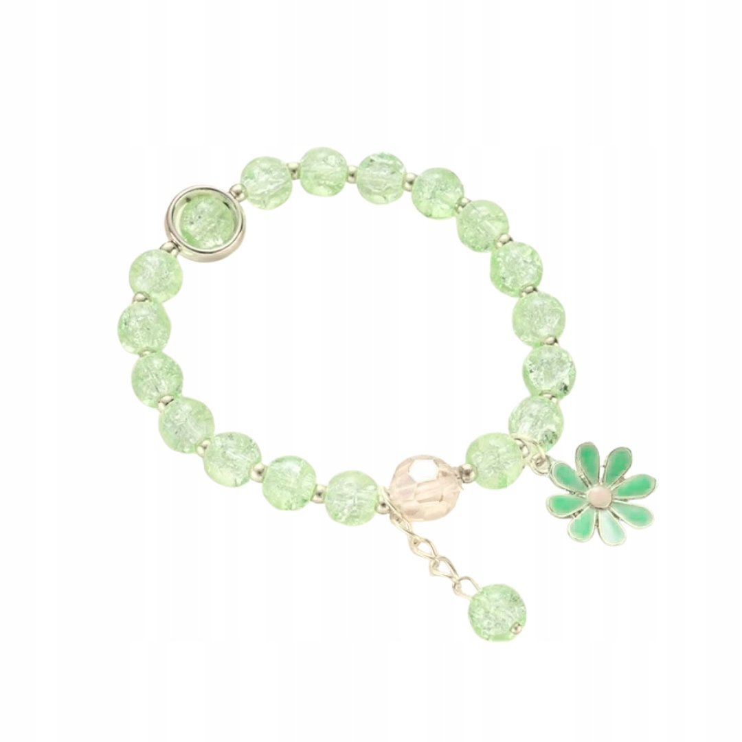 Zielona bransoletka na gumce z zawieszką kwiatka i błyszczącymi koralikami