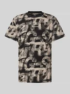 Koszulki męskie - T-shirt o luźnym kroju z nadrukiem z logo - miniaturka - grafika 1