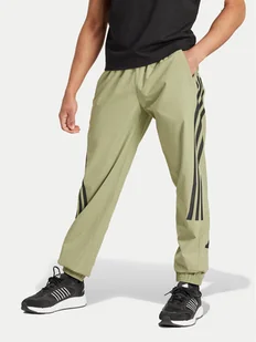 adidas Spodnie dresowe Future Icons 3-Stripes IW8549 Zielony Regular Fit - Spodnie sportowe męskie - miniaturka - grafika 1